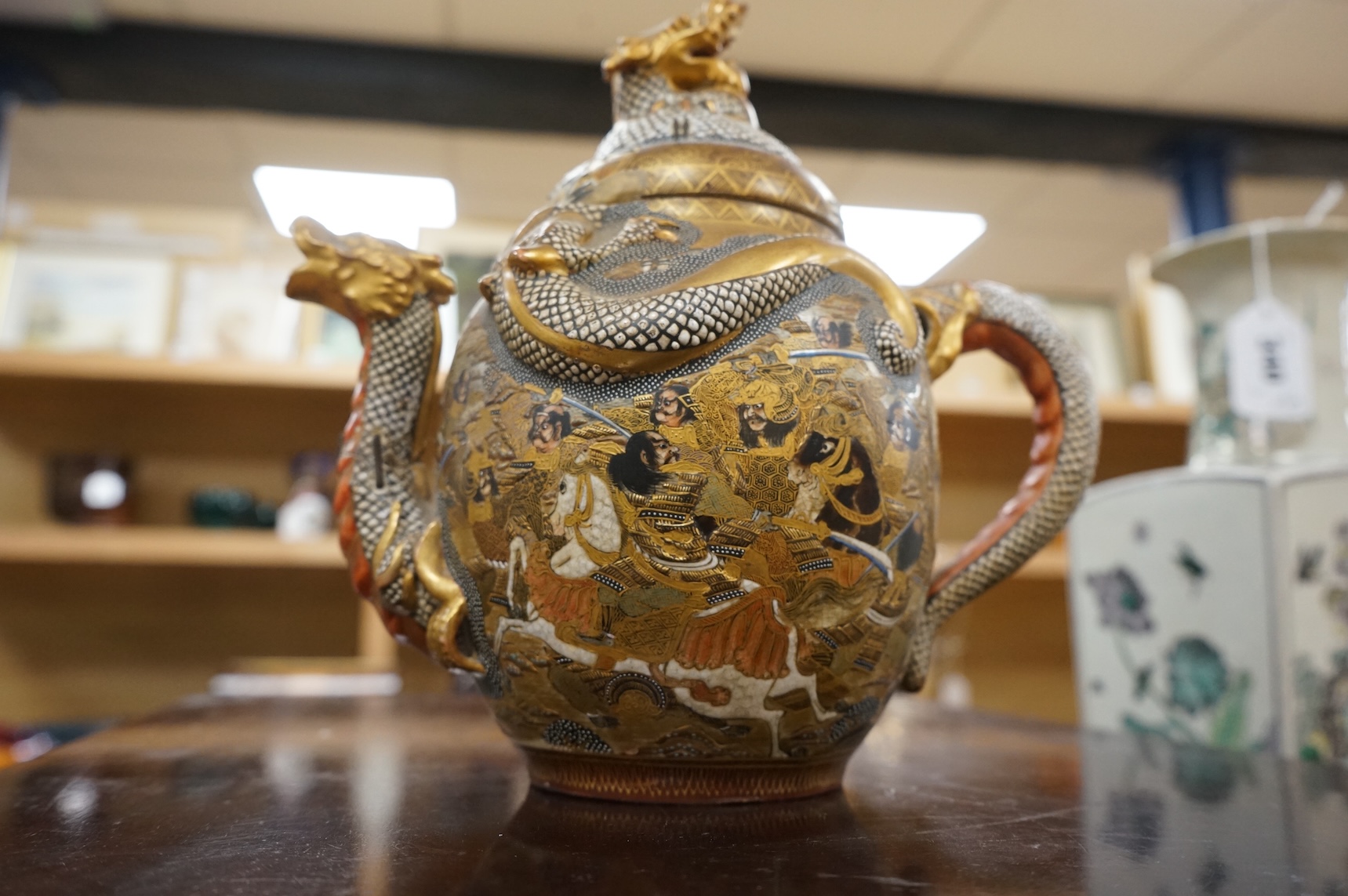 A Japanese Satsuma teapot dragon, Meiji period, 23cm high